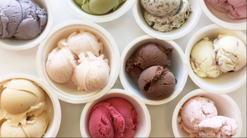 Aerial view of colorful handcrafted ice cream scoops arranged in a display